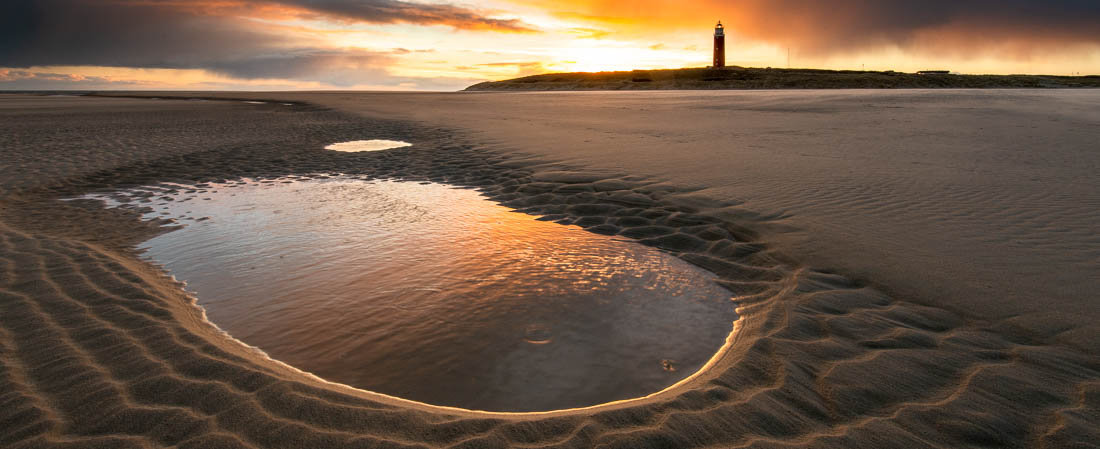 Sunrise at Lighthouse Texel Beach